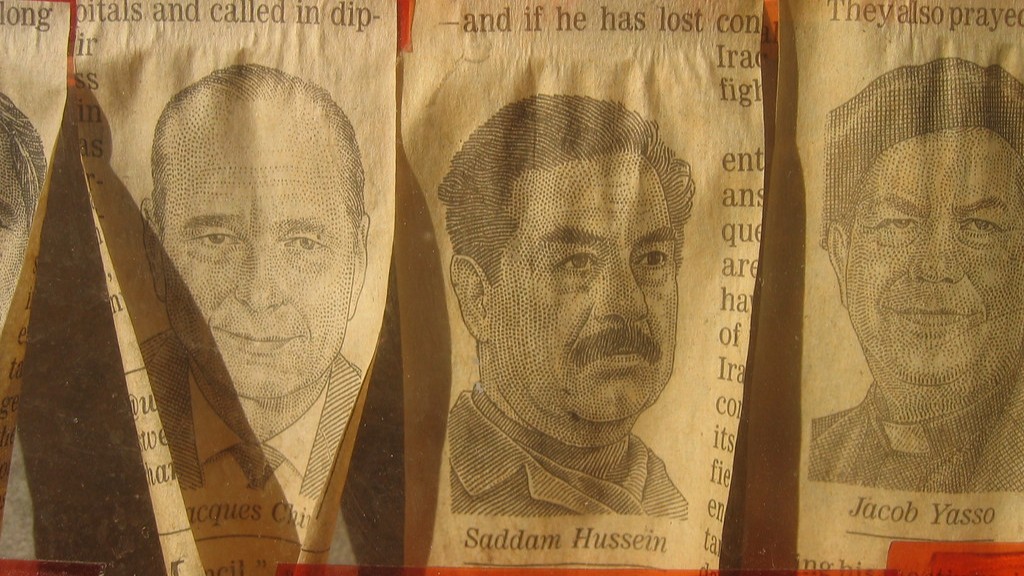 What country did saddam hussein invade?